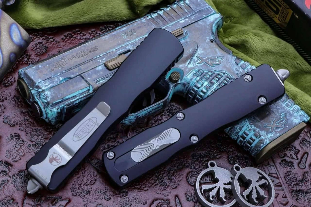 All Knife Brands Microtech 227-12 Dirac Delta D/E - Black Handle - Stonewashed Full Serration 6 All Knife Brands Microtech 227-12 Dirac Delta D/E - Black Handle - Stonewashed Full Serration